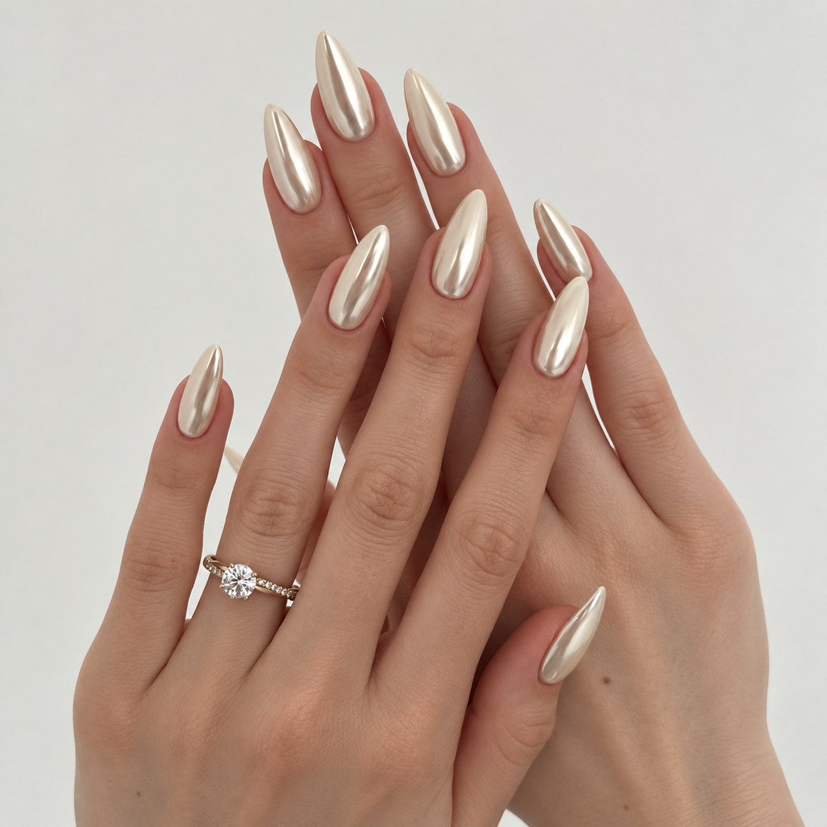 Vanilla Pearl champagne pearl chrome long almond press-on nails